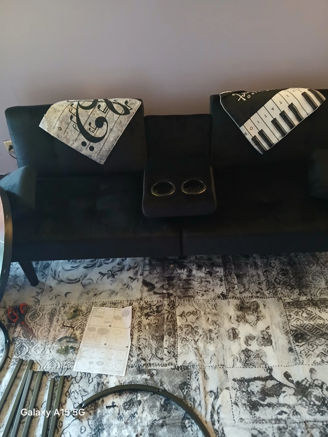Black Sofa with Cup Piano Themed Pillows sleeper sofa