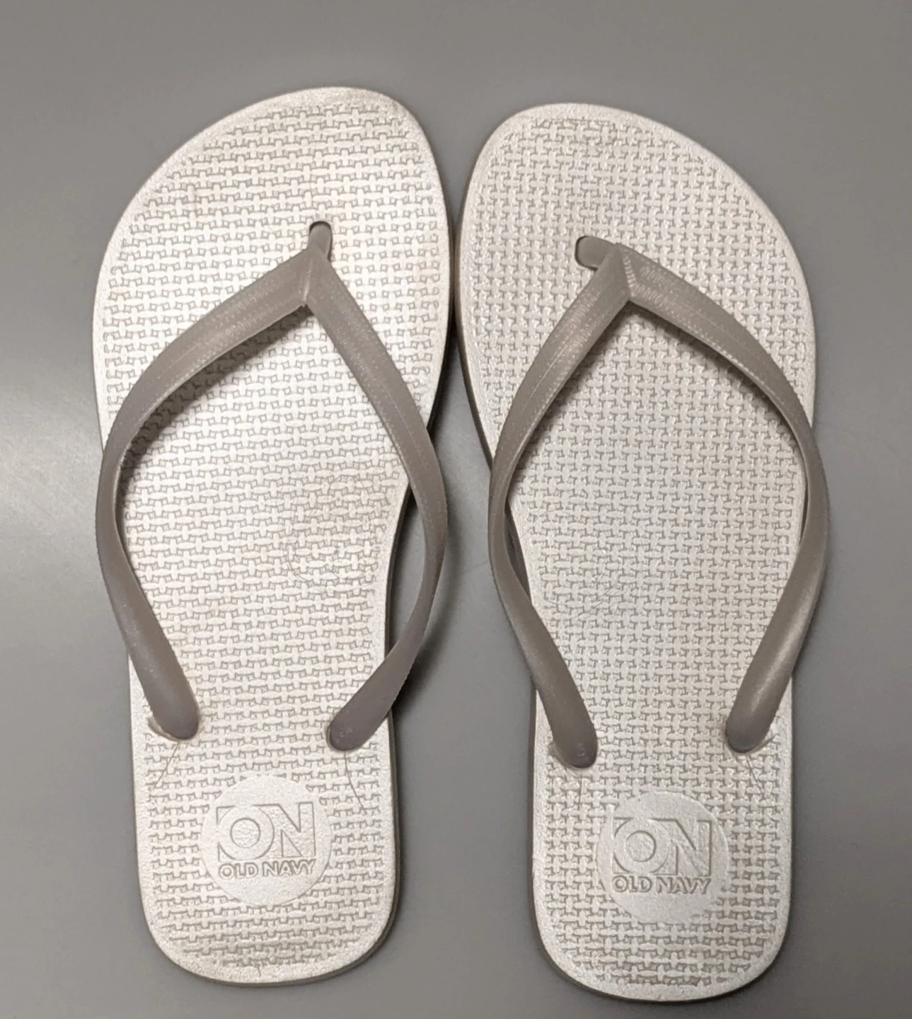 Size 5 pearly white flip flops