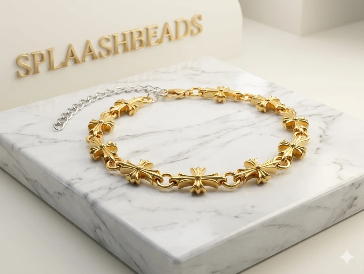 Splashbeads Gold Tone Bracelet with Cross Motifs