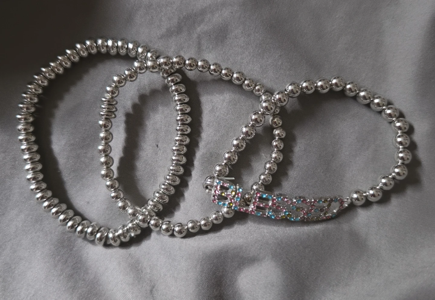 Set of 3 Silver Beaded Bracelets with Rhinestone Charm