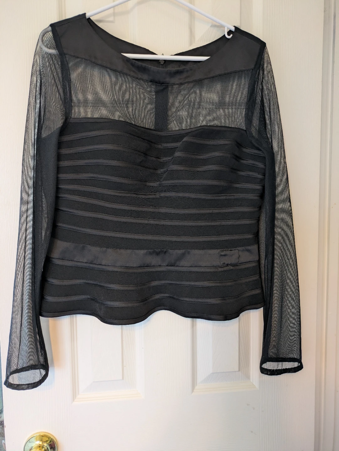 Black long sleeve top.