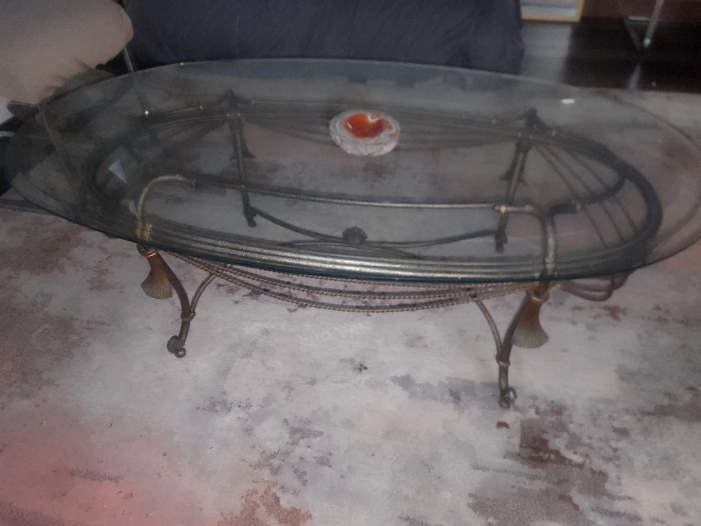 Oval Glass Coffee Table with Ornate Metal Base