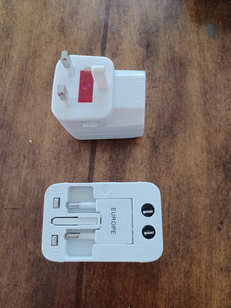 Travel Universal Adaptor and USB Power Port - photo 3
