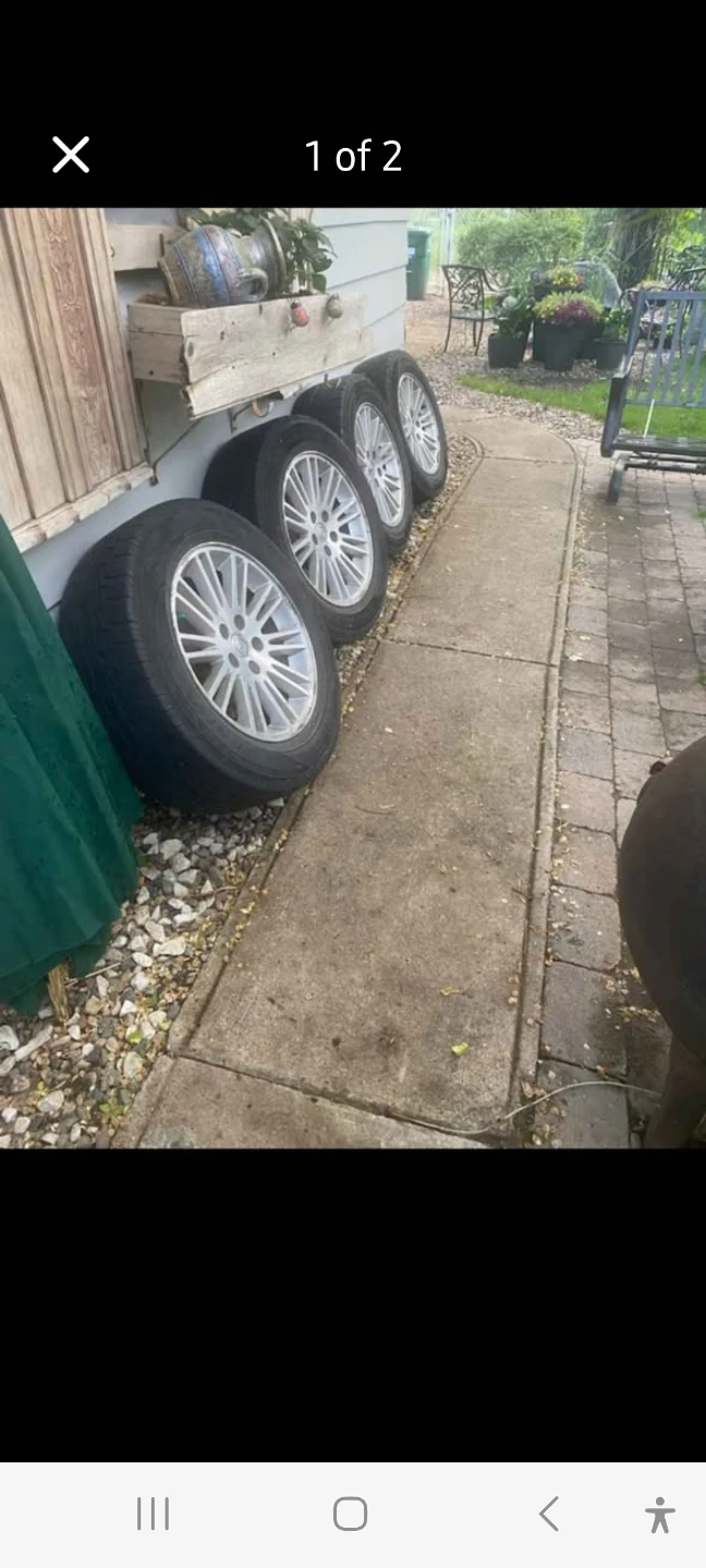 Set of 4 Used Winter Tires and Rims P215-R55-17