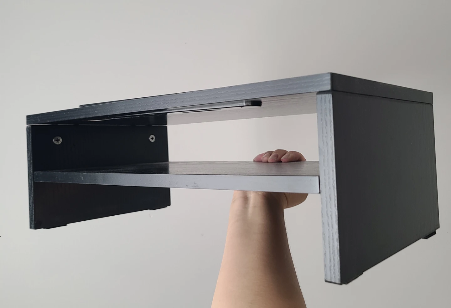 Black monitor stand with shelf