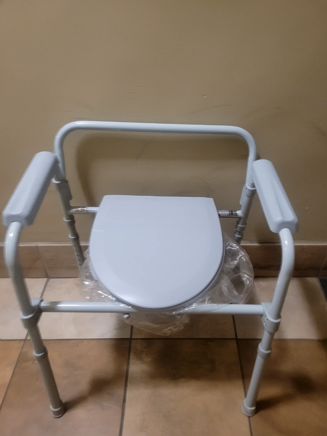 Adjustable Height Toilet with Padded Arms - photo 2