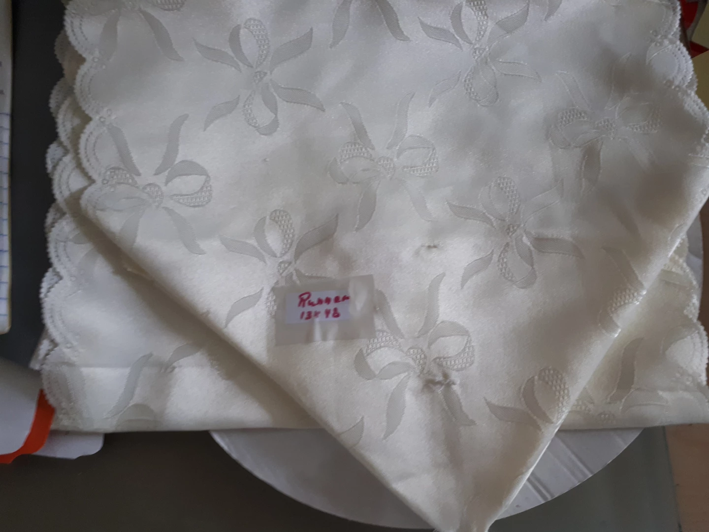 White Table Runner with Bow Pattern⚽