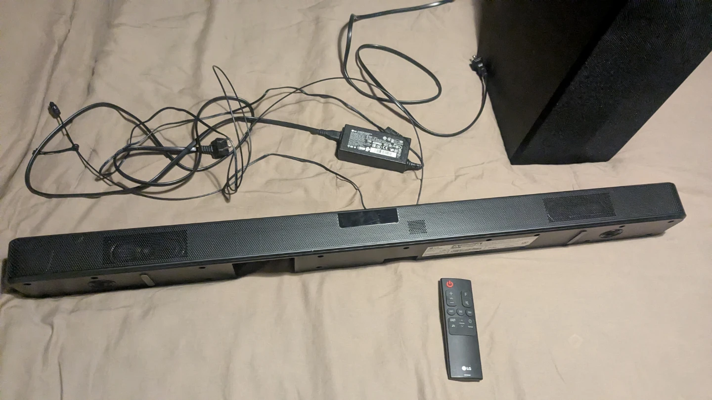 LG Soundbar with Subwoofer and Remote - photo 2