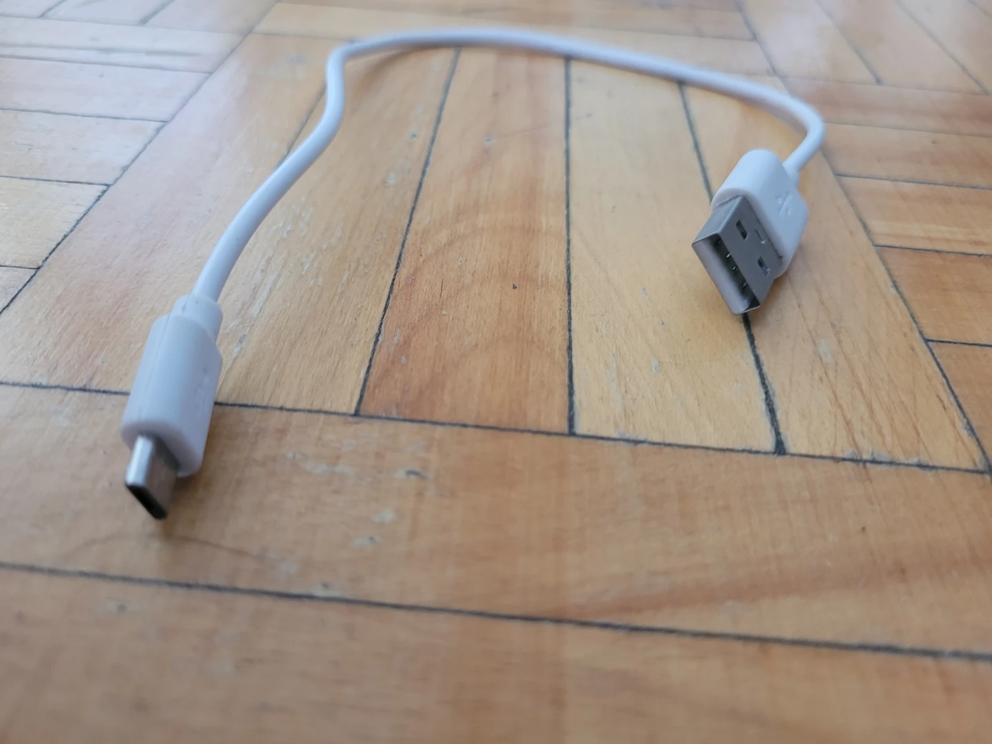 White USB to mini-USB Charging Cable