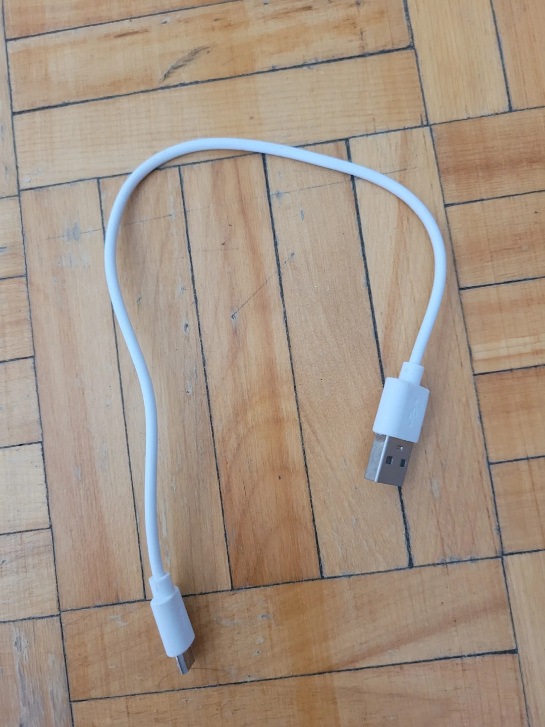 White USB to mini-USB Charging Cable - photo 2