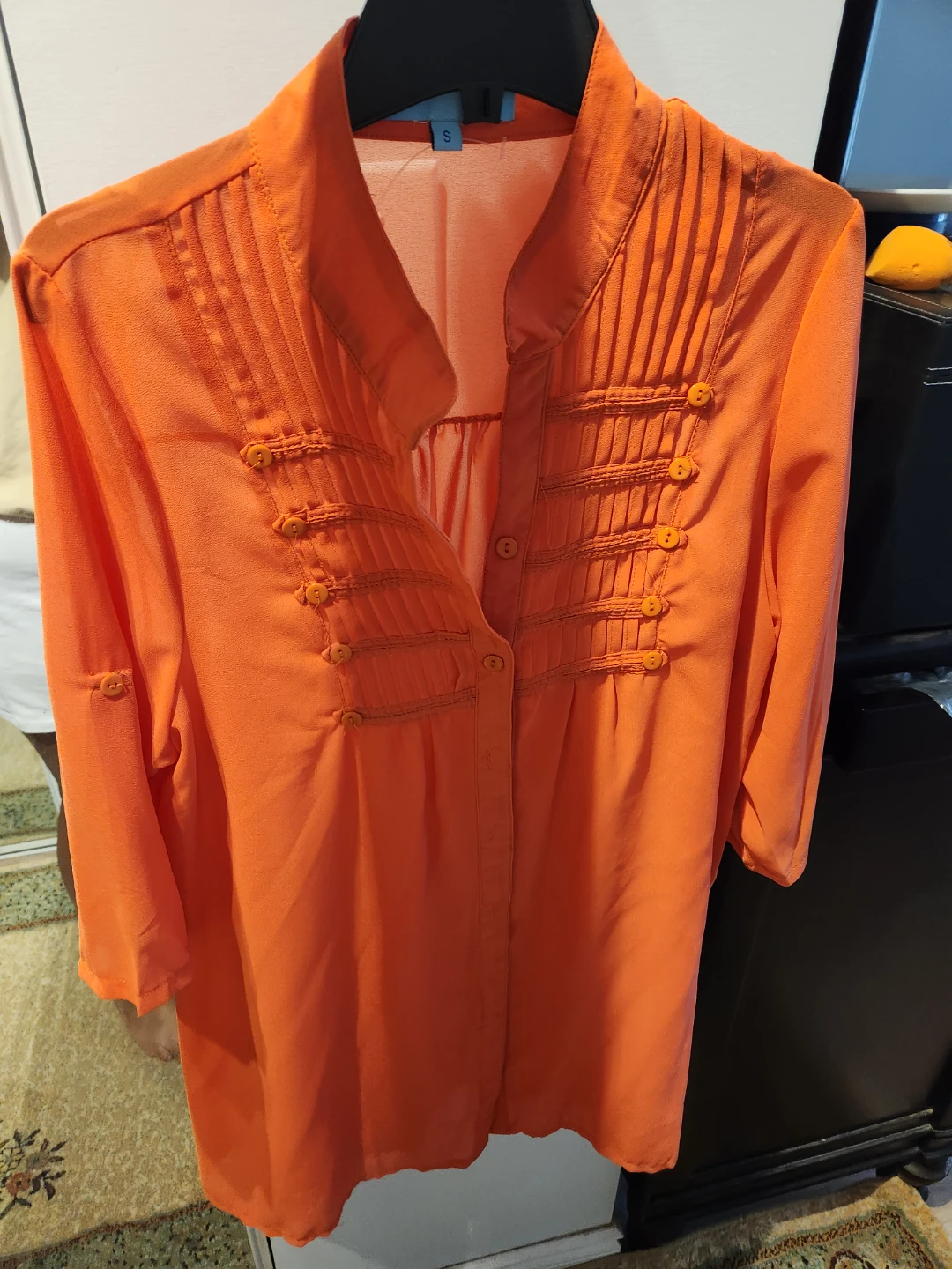 Orange pleated button-up shirt ⚽