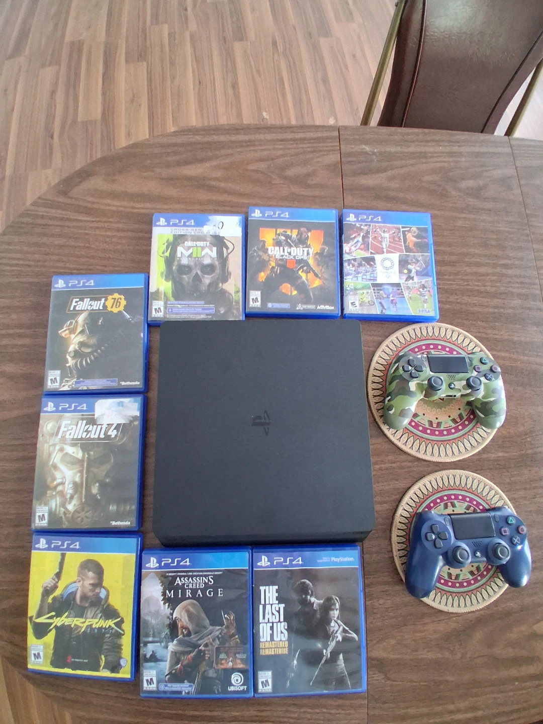 Sony PlayStation 4 Console with Games and Controllers