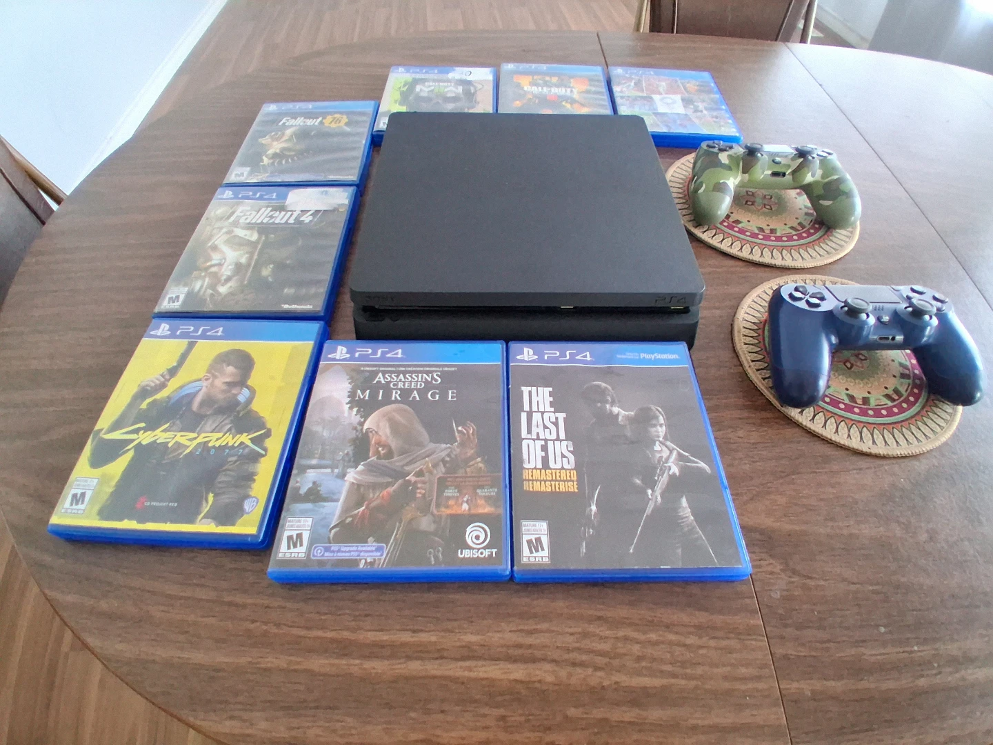 Sony PlayStation 4 Console with Games and Controllers - photo 3