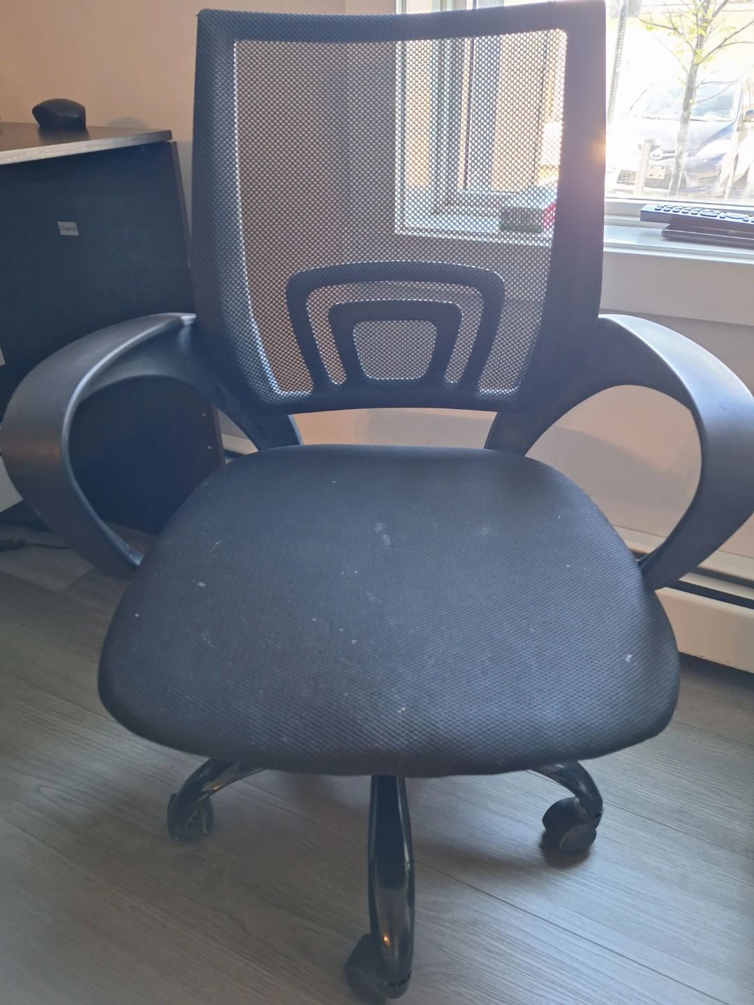 Black Mesh Office Chair and Dark Brown Desk