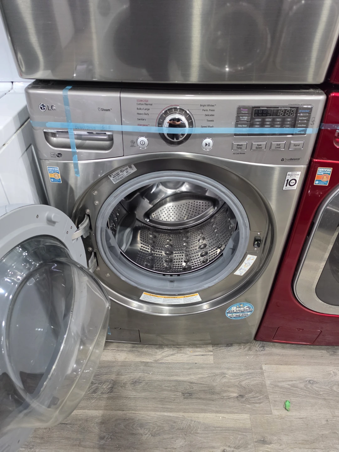 LG 27" Stainless Steel Front-Load Stackable Washer Dryer - photo 2
