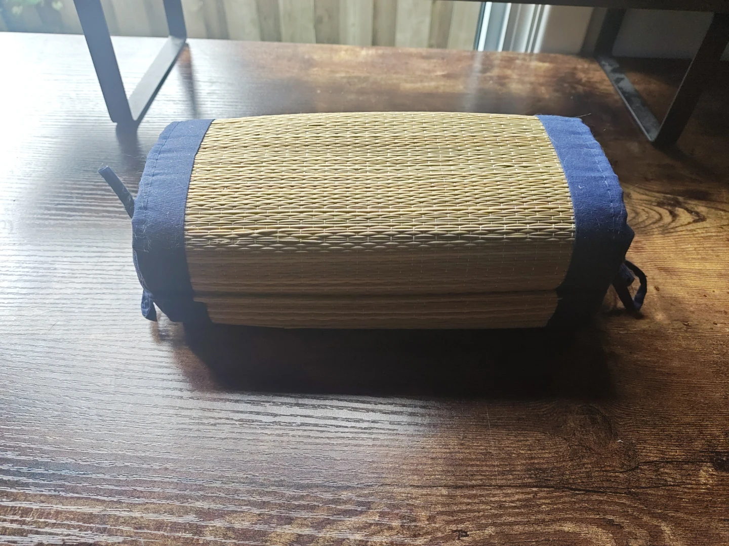 Woven Mat Roll Pillow with Blue Trim
