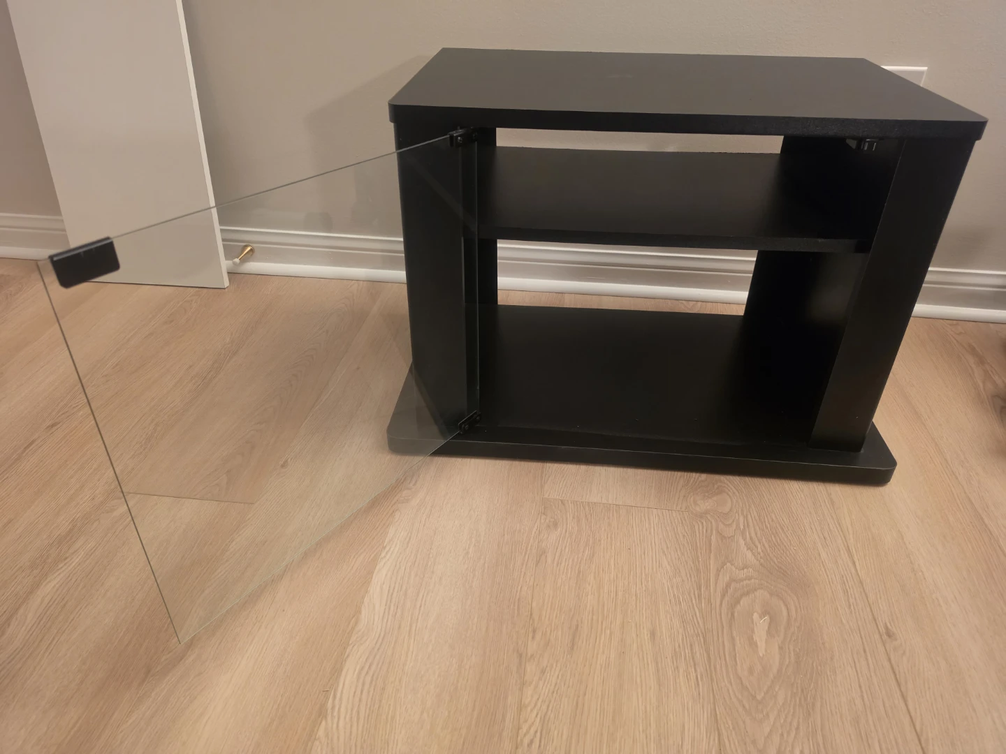 Black TV stand with glass door and storage - photo 4