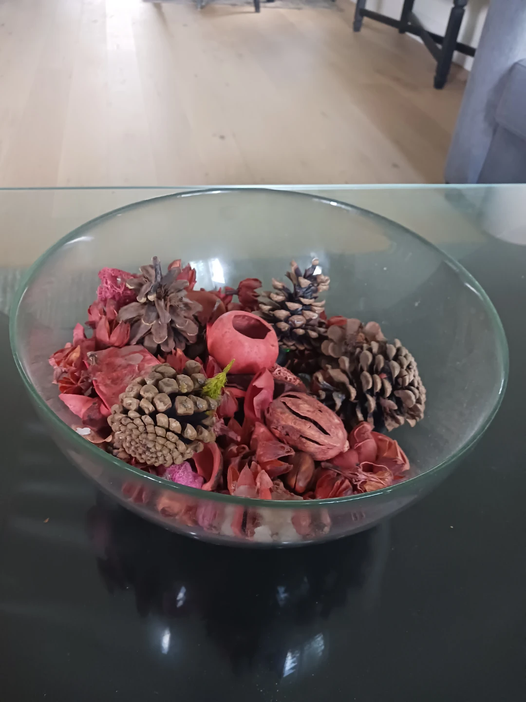 Potpourri bowl with pine cones and dried flowers