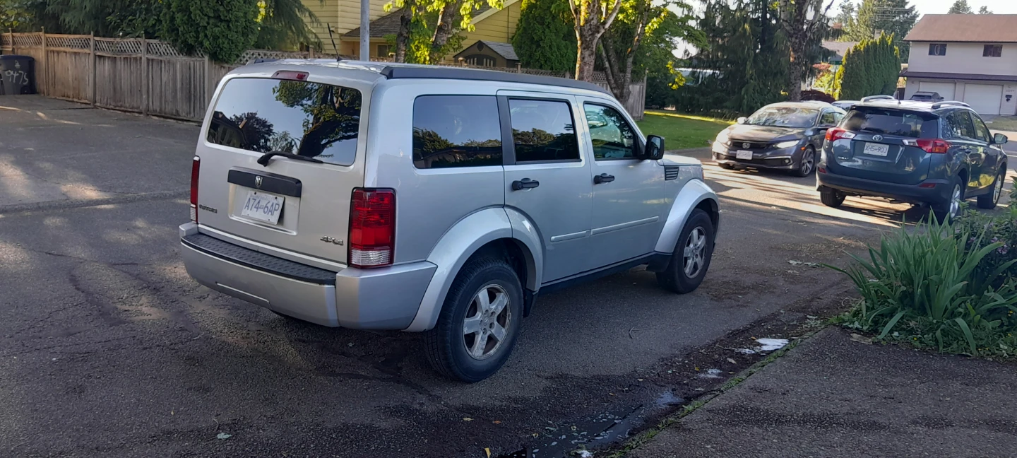Silver Dodge Nitro SUV - photo 5