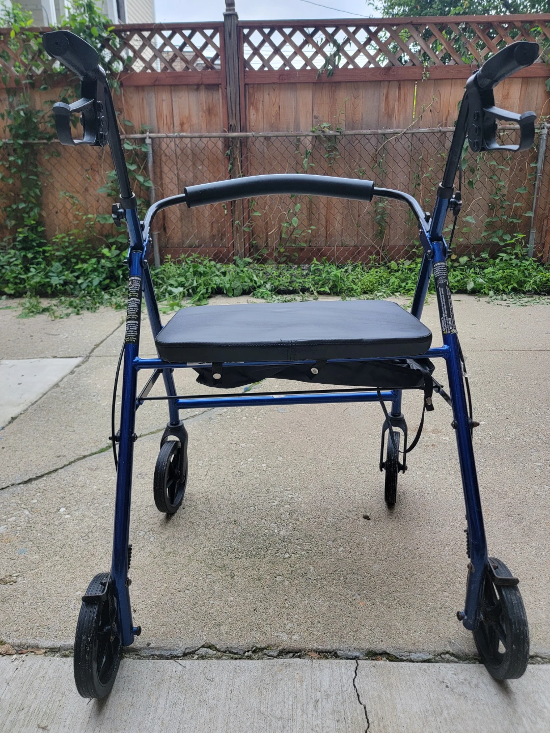 Blue 4-Wheel Walker with Seat and Brakes