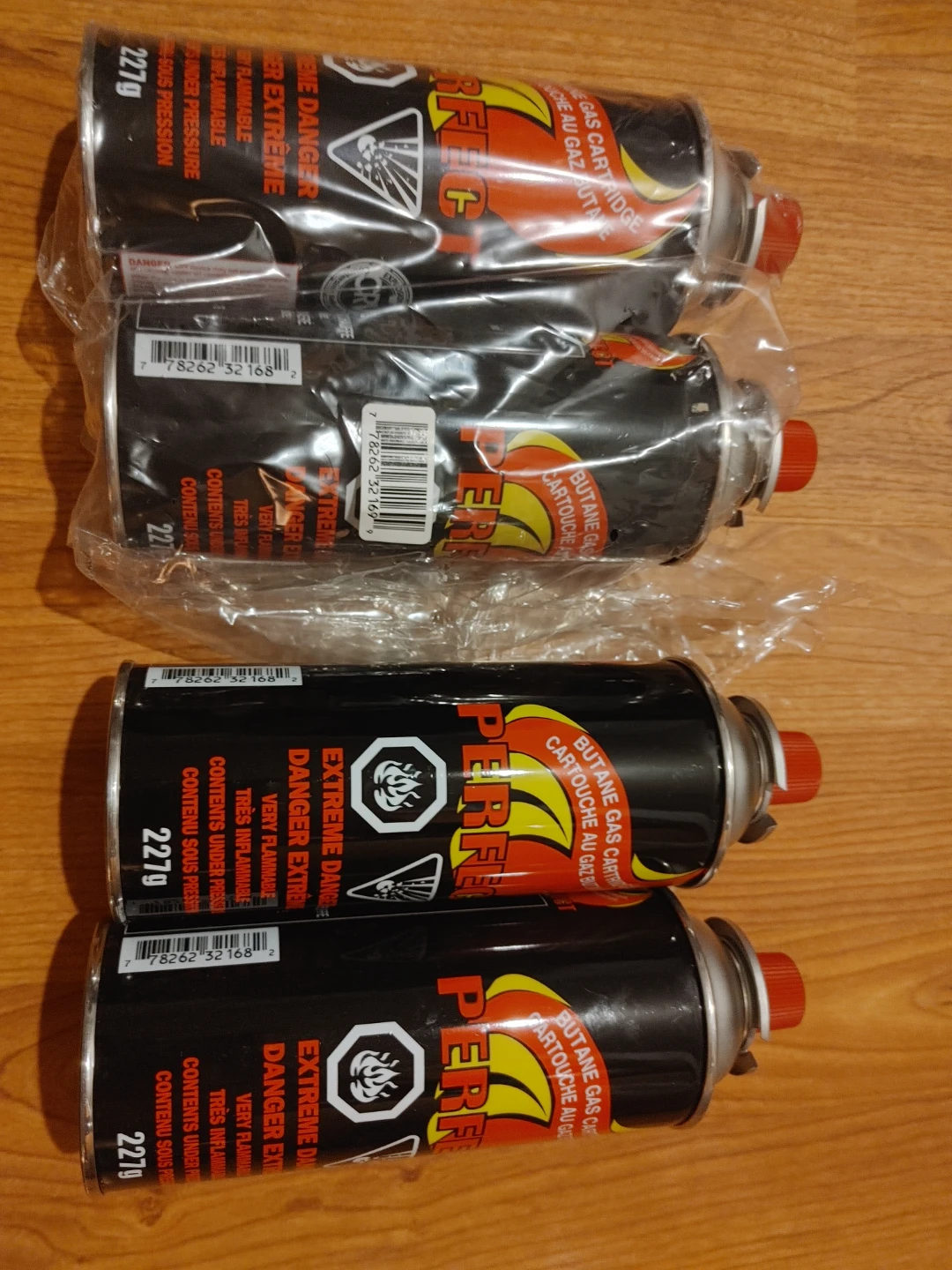 Camping/portable Butane Gas Cartridges (3 new, 1 used)
