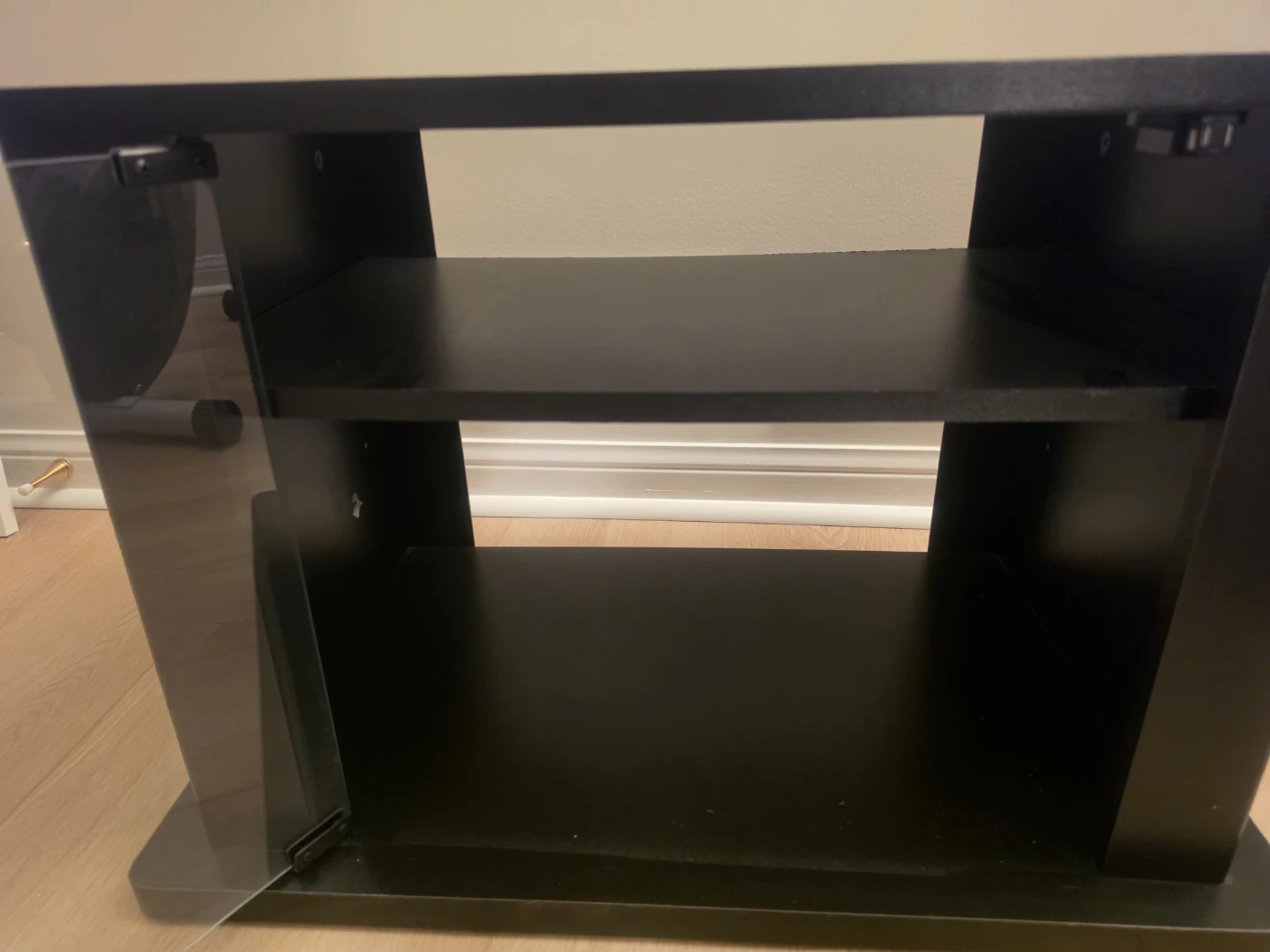 Black TV stand with glass door and storage - photo 2