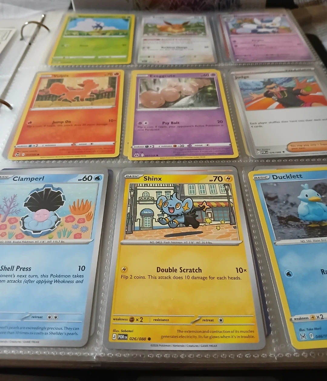 Pokémon cards with binder pages