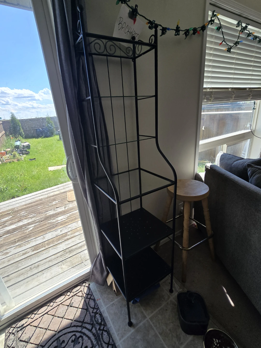 Black metal bakers rack with 4 shelves
