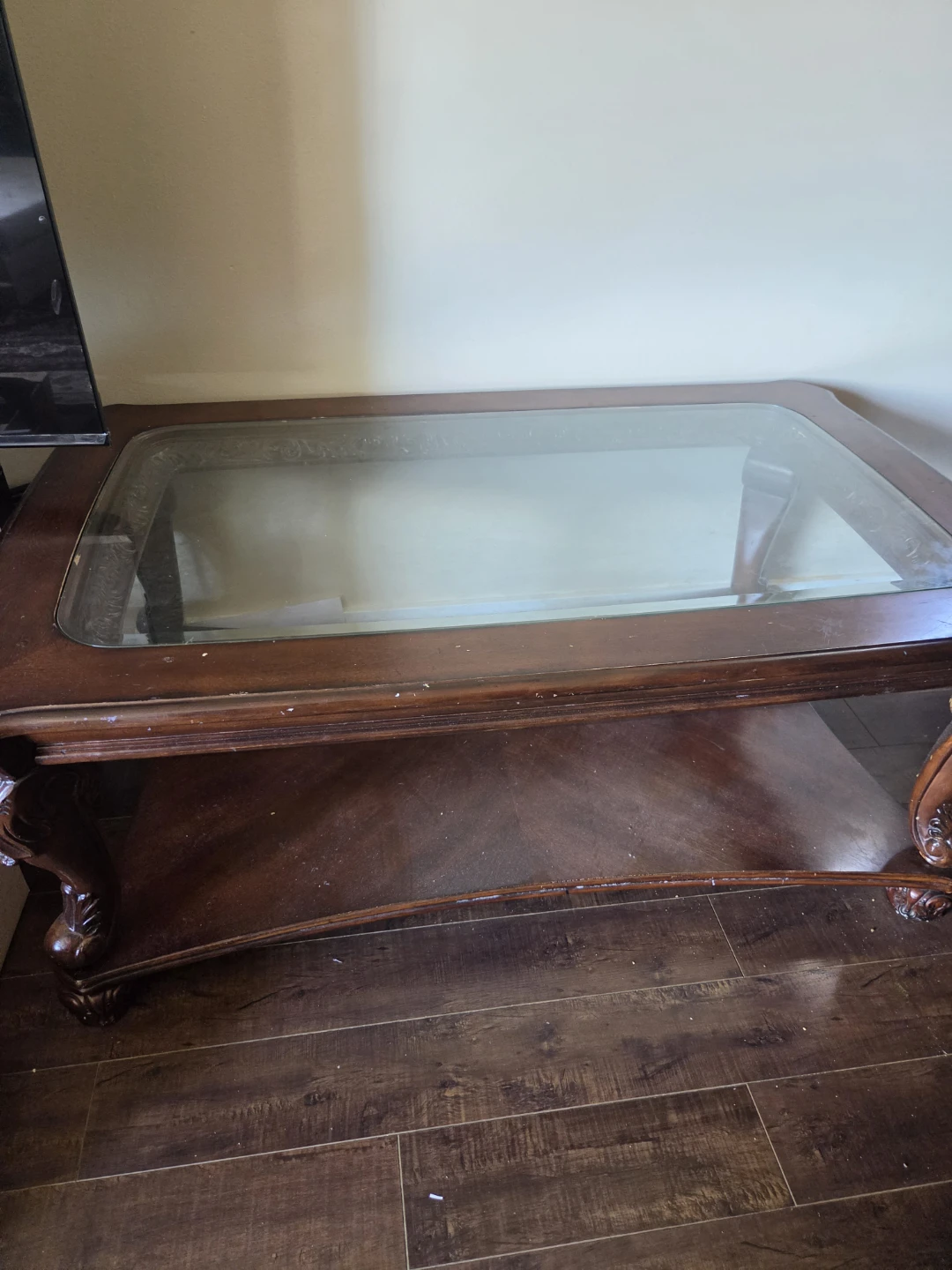 Wooden coffee table with glass top