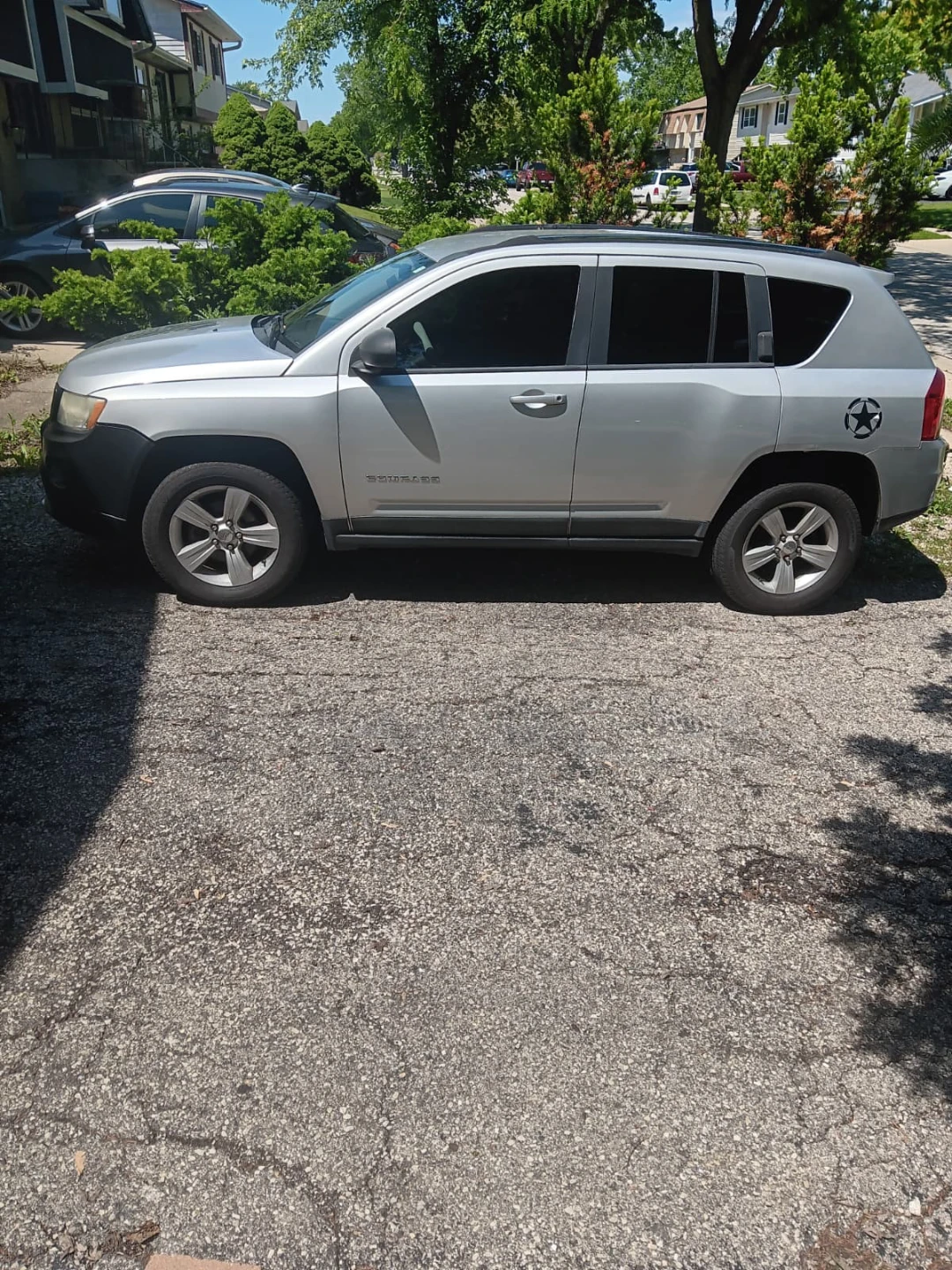 Silver Jeep Compass SUV - photo 2