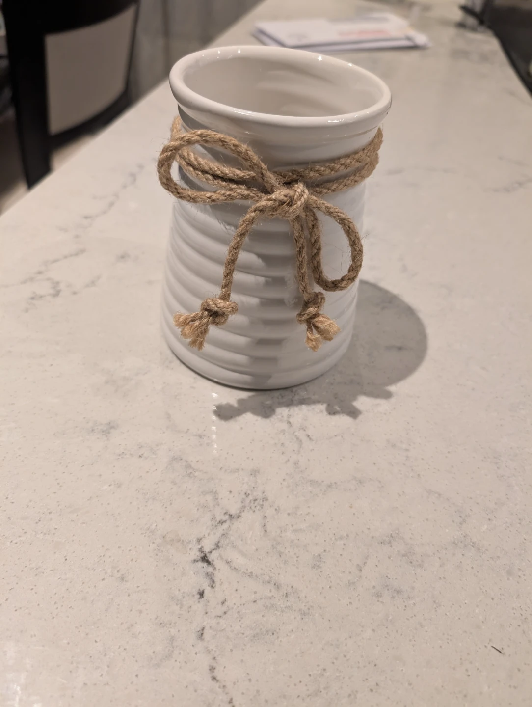 White ceramic utensil crock with rope detail