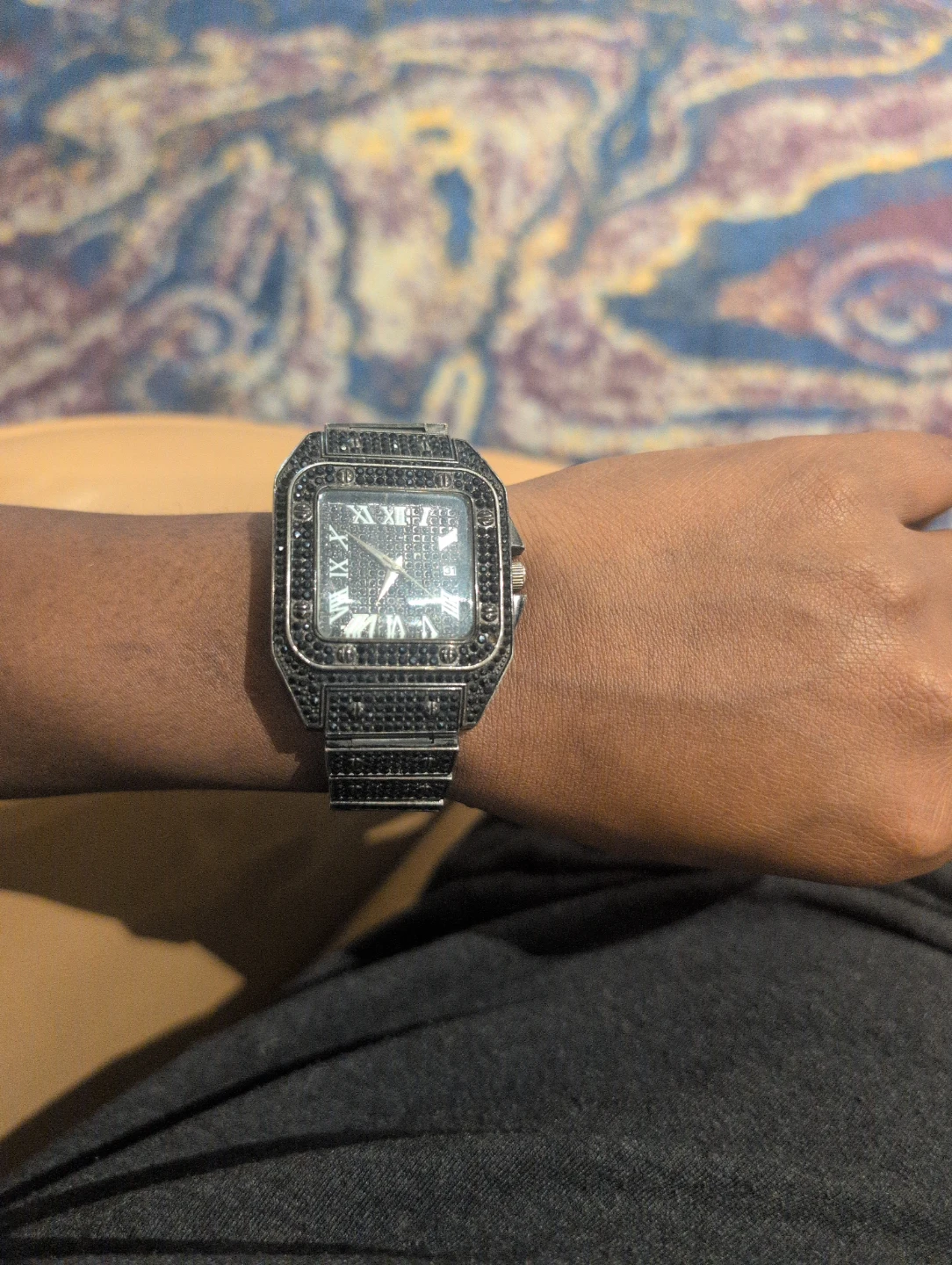 Square face watch with black stones