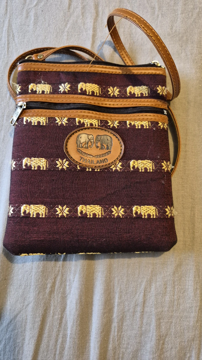 Small crossbody bag with elephant pattern