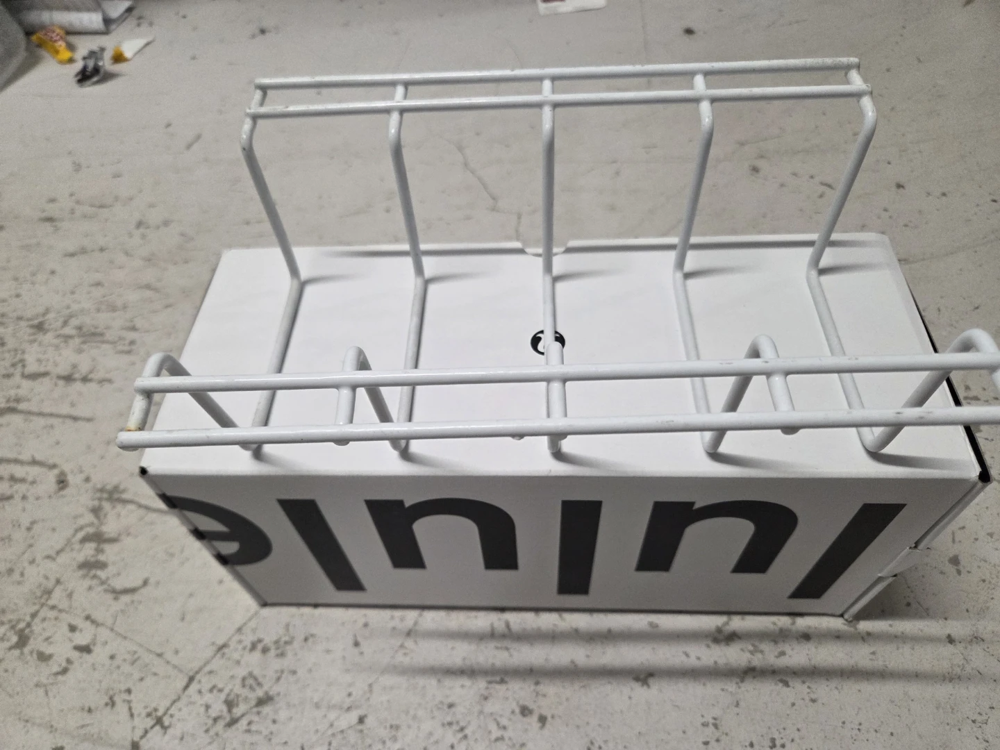 White Wall-Mounted Magazine Rack