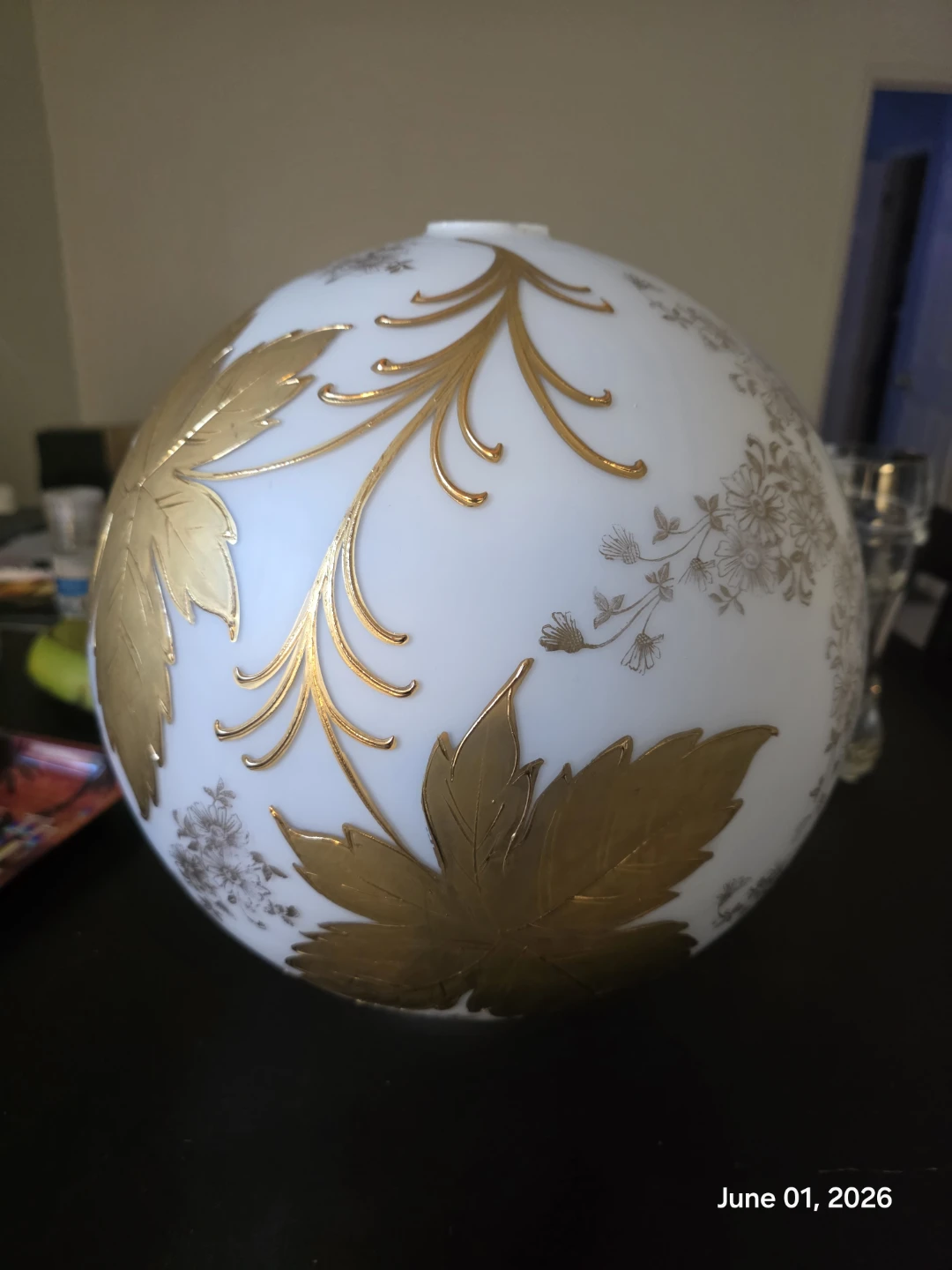 White globe light fixture with gold leaf and floral accents - photo 2