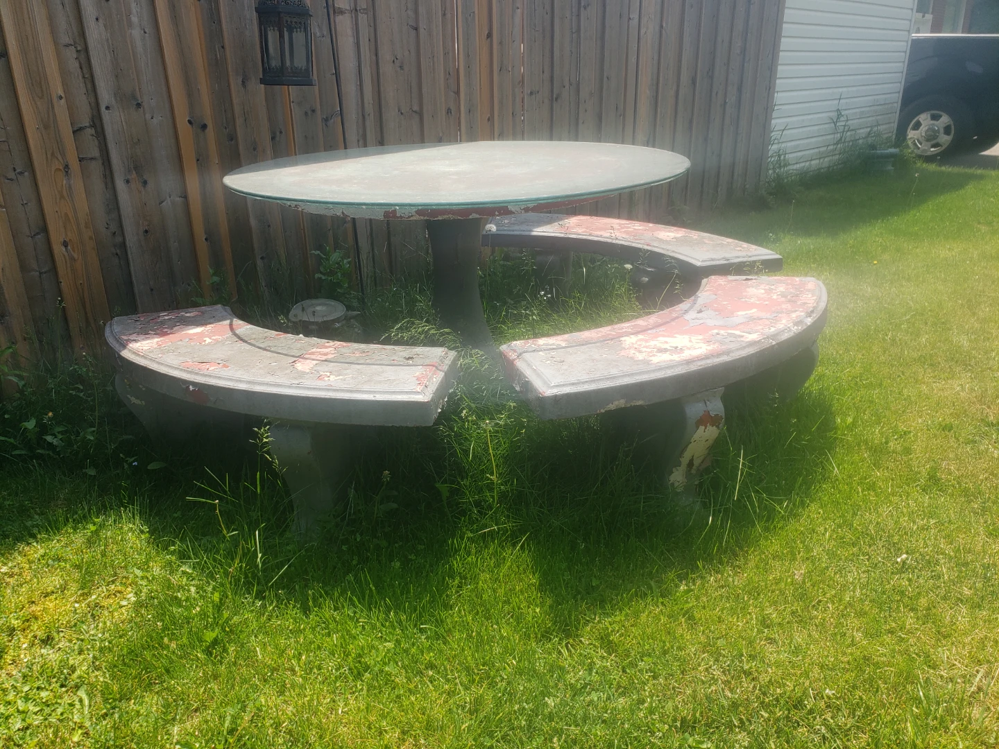 Concrete picnic table with attached benches