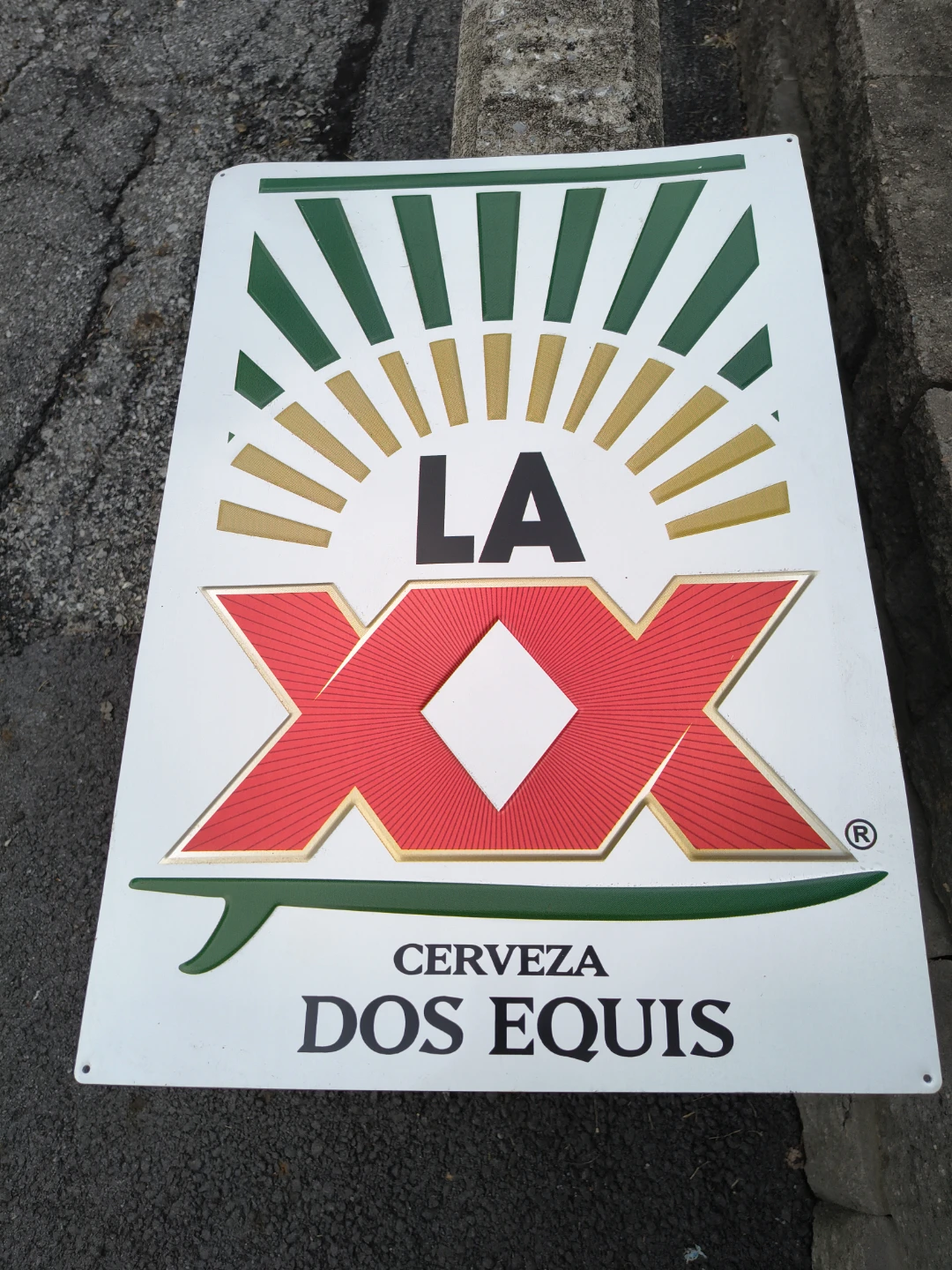 Dos Equis metal sign