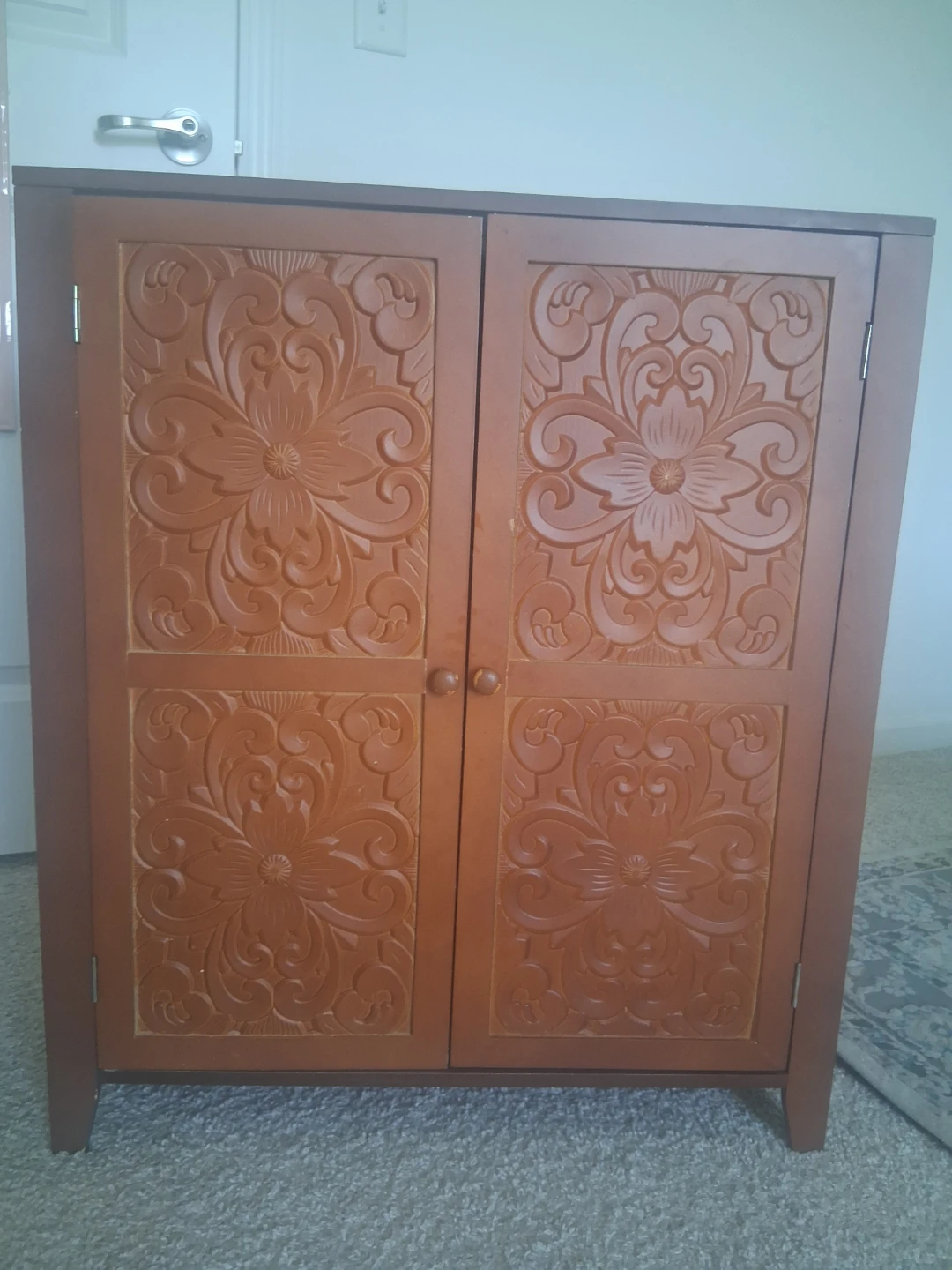 Wooden Cabinet with Carved Doors