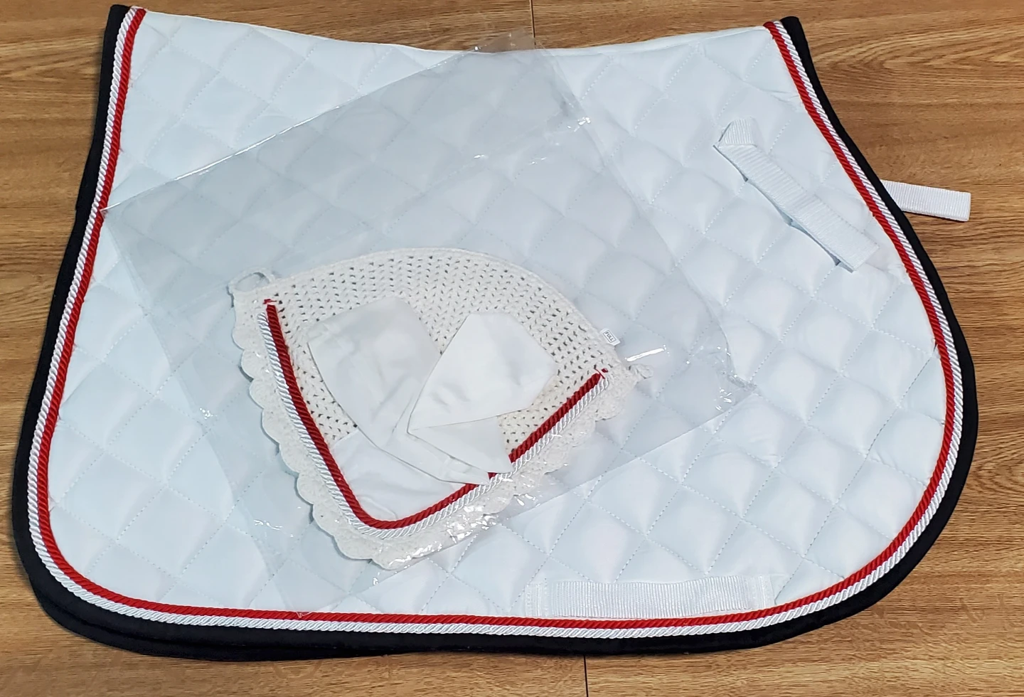 White Quilted Saddle Pad with Red and Black Trim