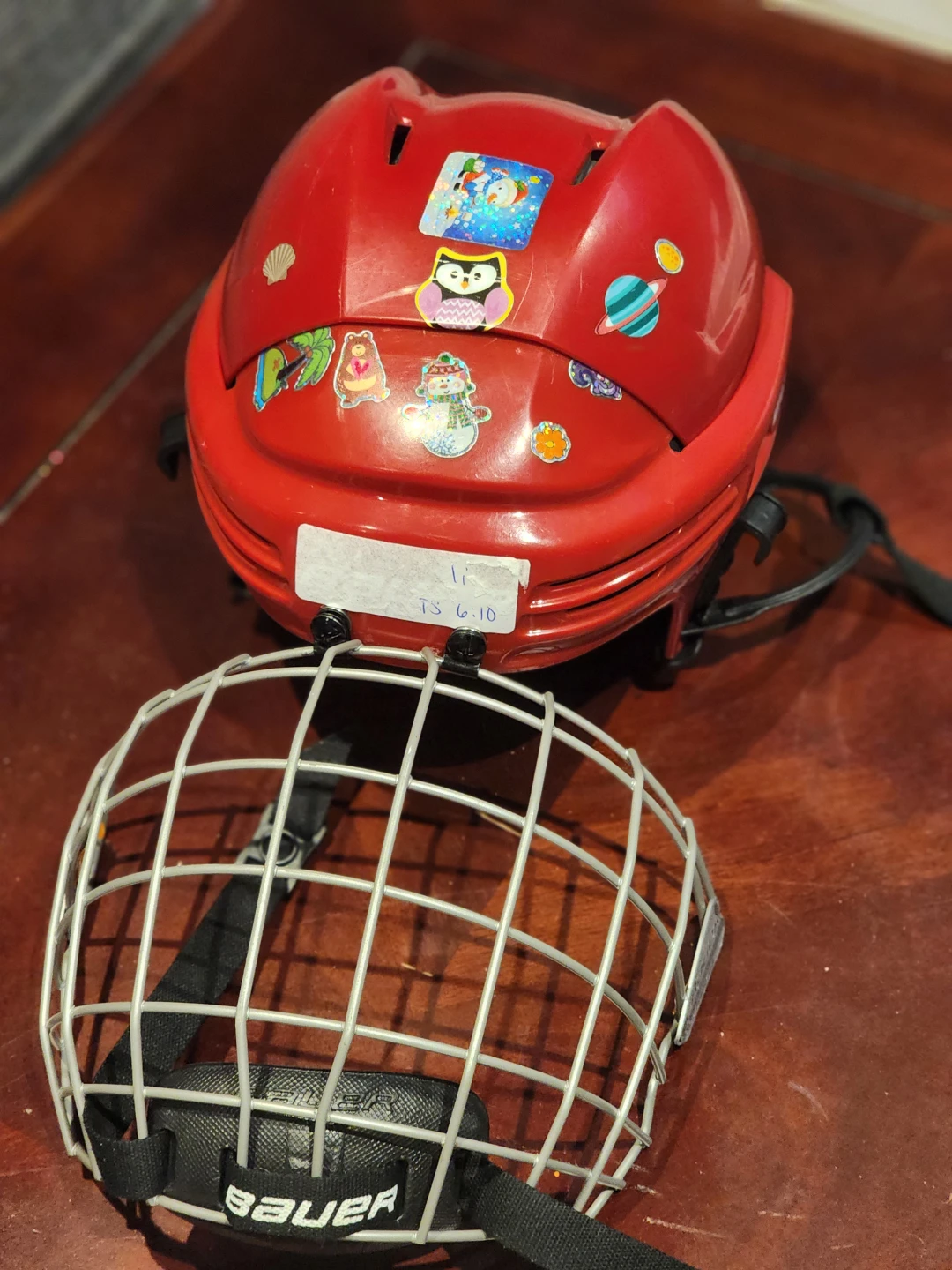 Bauer Red Hockey Helmet with Cage