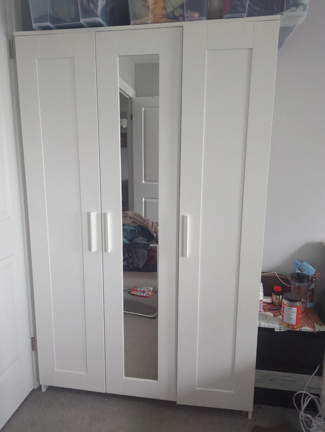 White 3-door wardrobe with mirrored centre doors