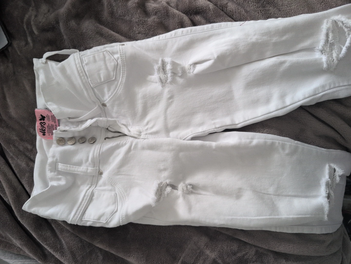 White distressed Colombian butt lifting skinny jeans