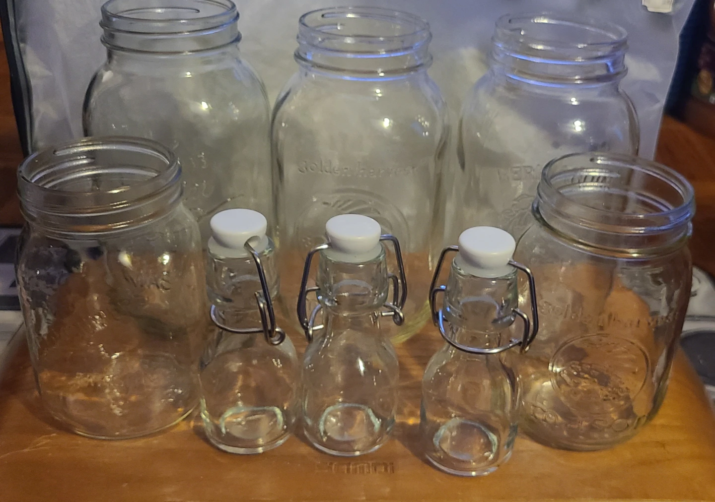 ⚽Set of 3 Mini Glass Bottles with Swing Top Lids