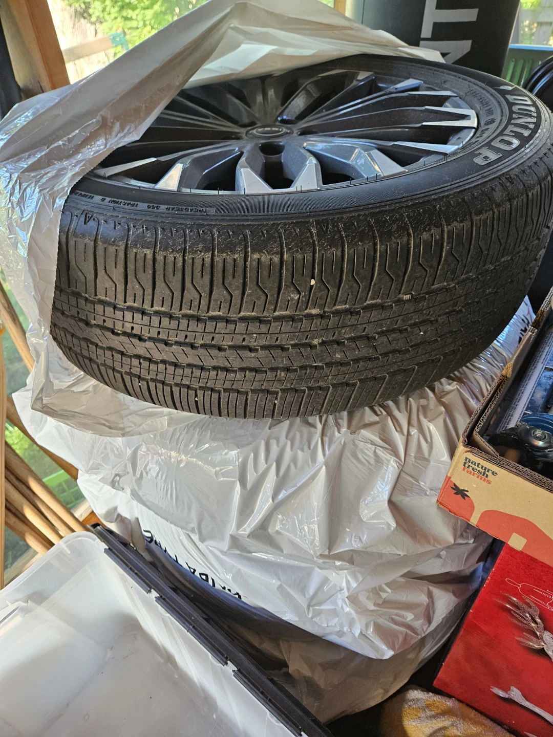 Set of 4 Dunlop Tires with original rims.  235/55R19