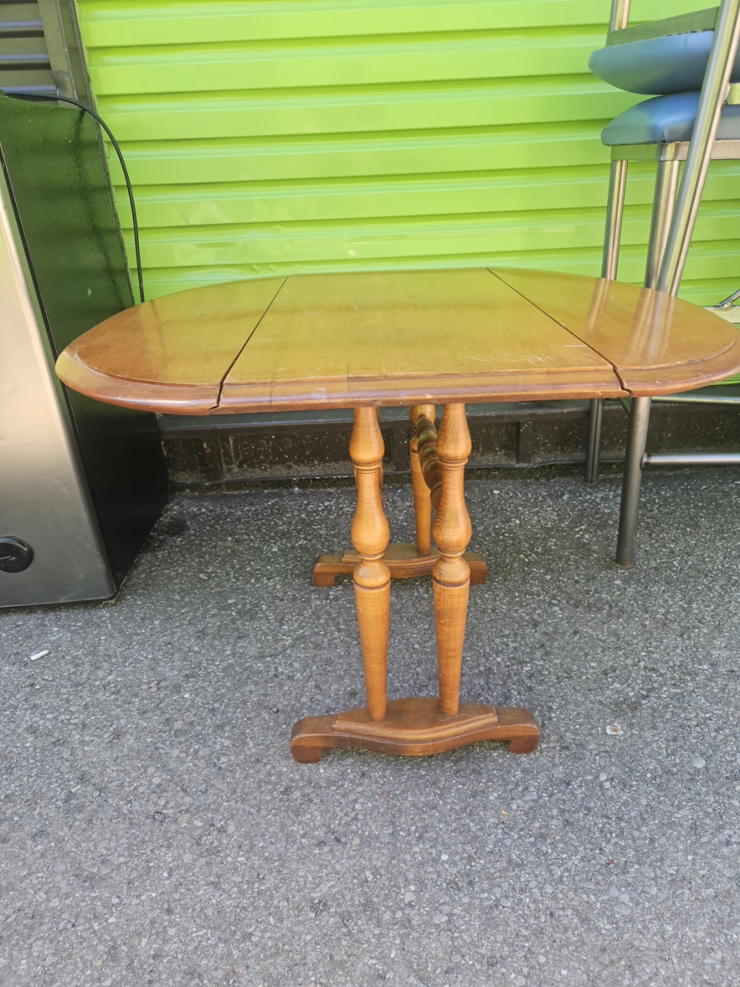 Wooden drop-leaf table