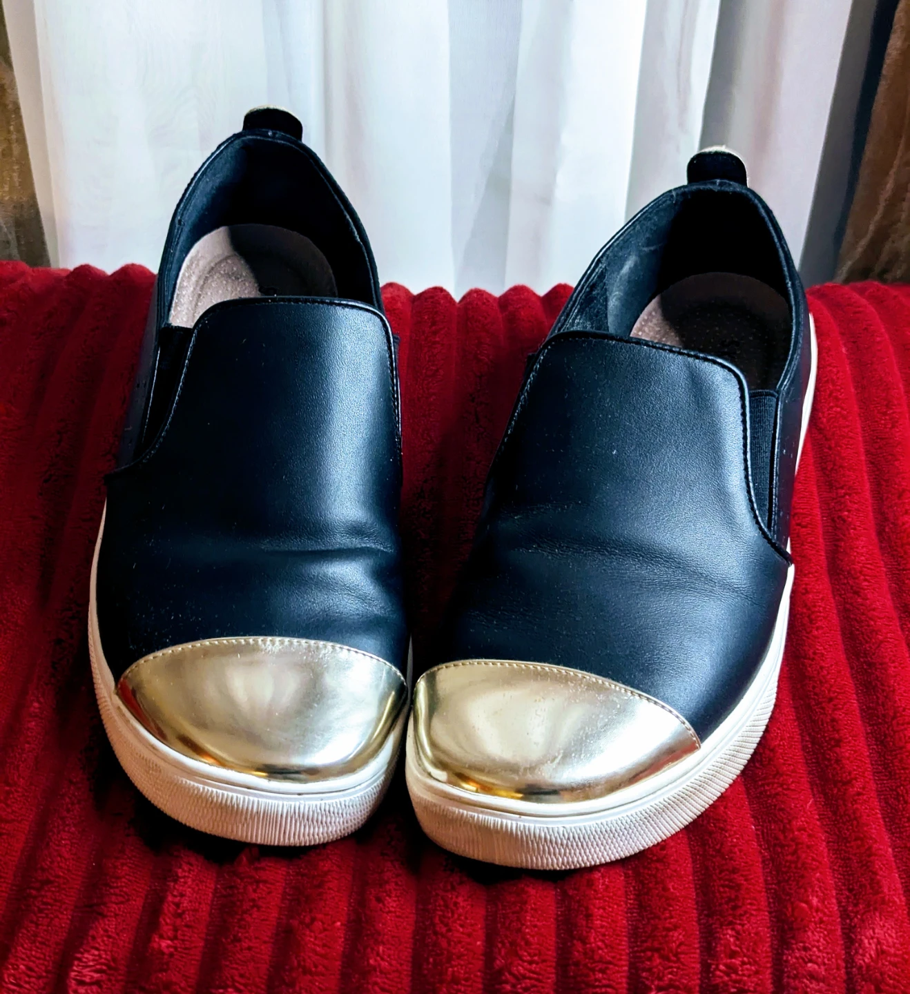 Black slip-on sneakers with gold cap toe - photo 2