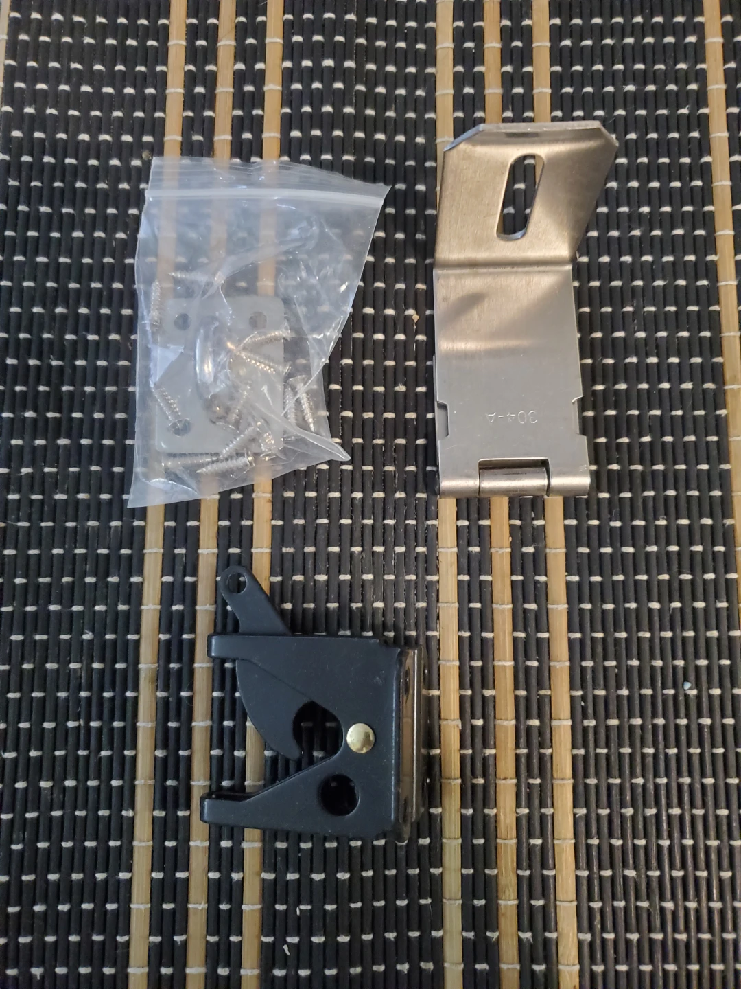 Pad lock and gate latch