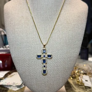 Gold Tone Cross Pendant Necklace with Blue Stones