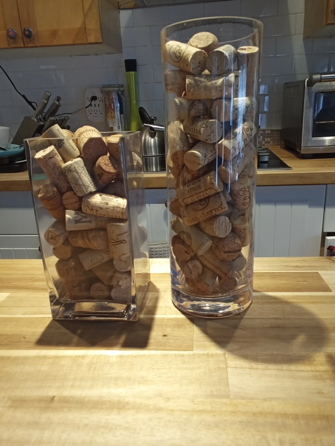 Set of 2 Glass Vases Filled with Wine Corks