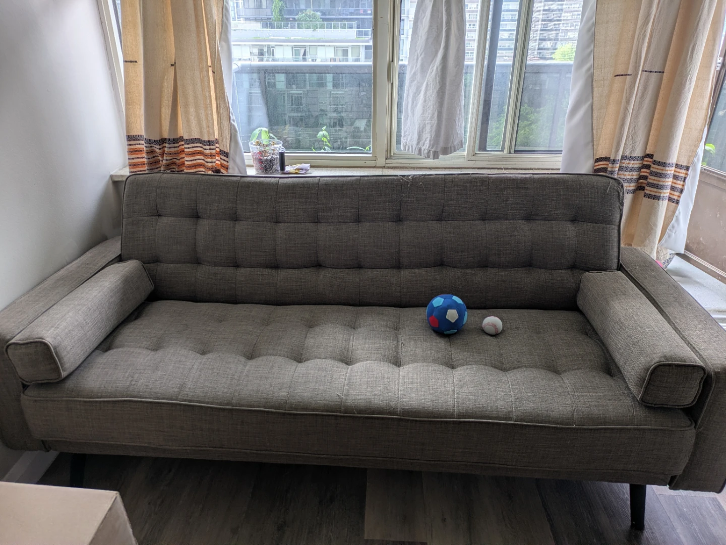 Cat Owner's Grey Tufted Sofa